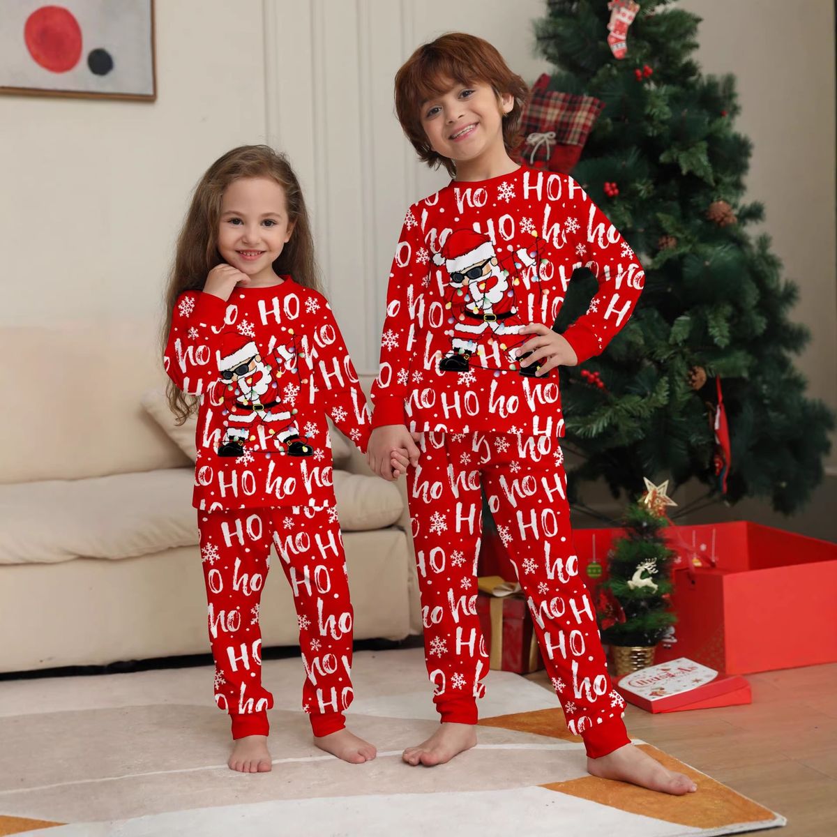 Julepyjamas Rocking Santa til barn- Match hele familien